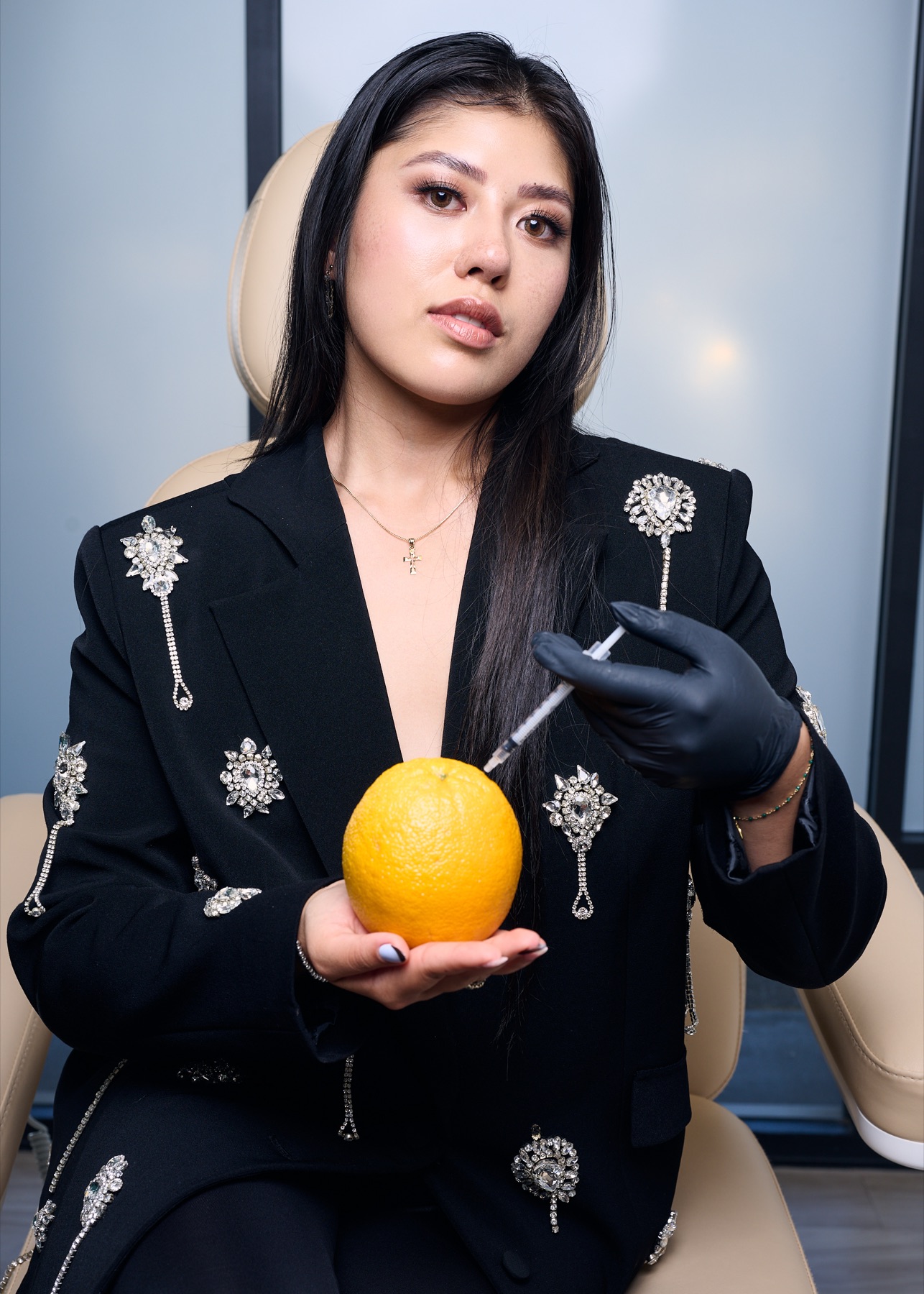 Jennae Ty-De Guzman, lead injector and owner of Excell Atelier