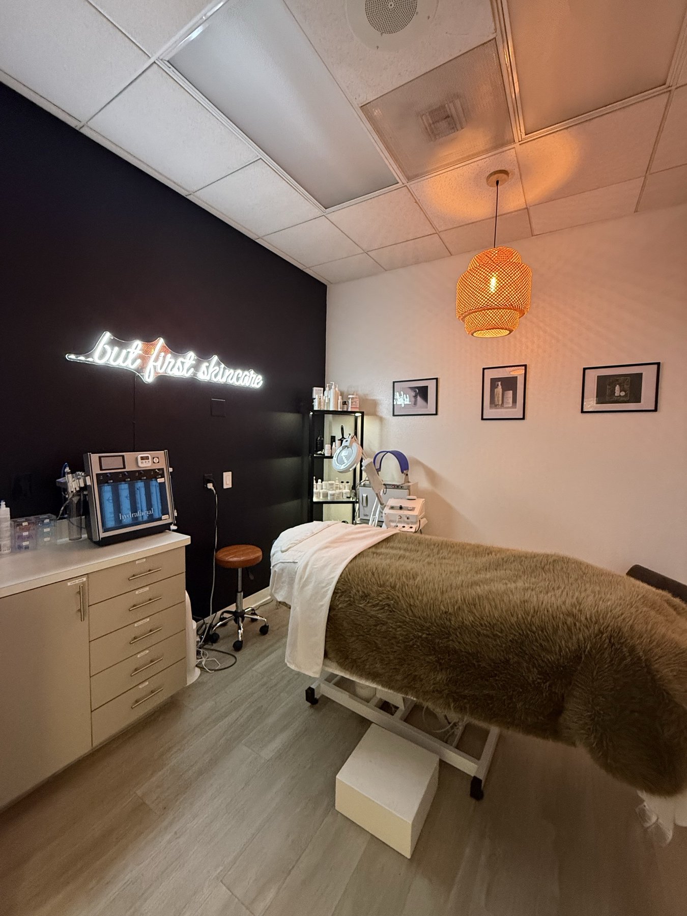 Treatment room with private neon-lit lounge